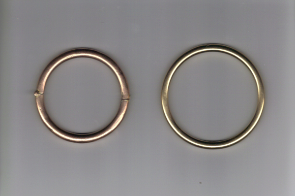 Fig. 1 A 100 year old hinged Nellie Stewart bangle (L), larger contemporary golf bangle (R) (property of the author)