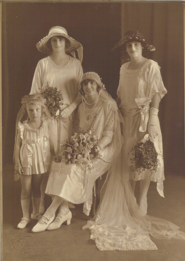 Fig. 6. Left. Studio portrait of the author’s grandparents’ wedding party 1923, Toowoomba, Queensland. Nellie Stewart bangle is seen on arm of bridesmaid Julie Boyd, far right. Alma Curtis, trainbearer, already wears bangles, possibly given to her upon her christening or birthday.