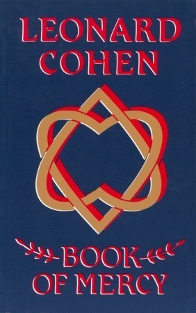 Dark blue book cover with the words "Leonard Cohen" at the top in red block lettering, a design of intertwined hearts in gold outlined in red in the middle, and the tile "Book of Mercy" in red block lettering at the bottom.